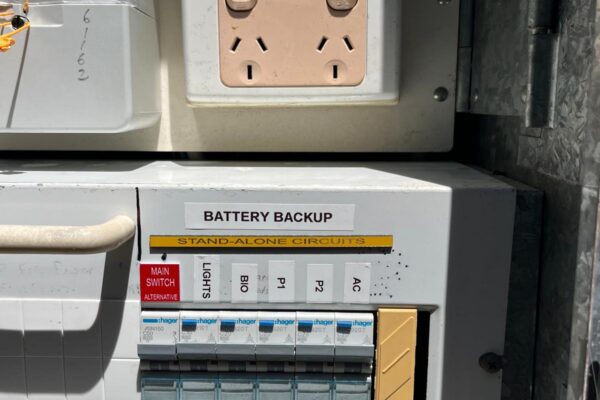 Battery backup circuit labels in a Gold Coast switchboard