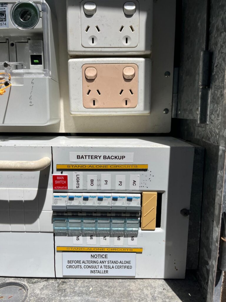 Battery backup circuit labels in a Gold Coast switchboard